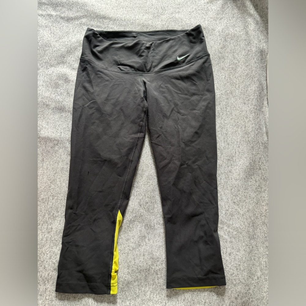 Nike Grey running cropped leggings sz Sm with yellow accents and hidden pocket